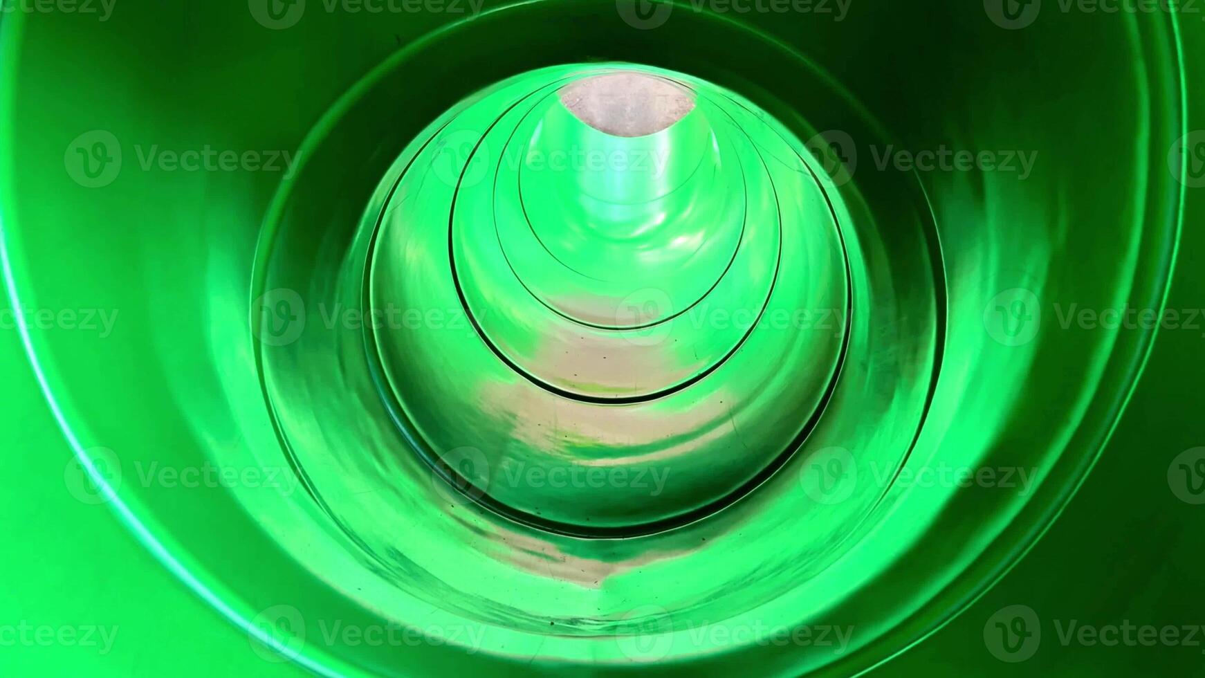 A green tunnel with a circular shape photo
