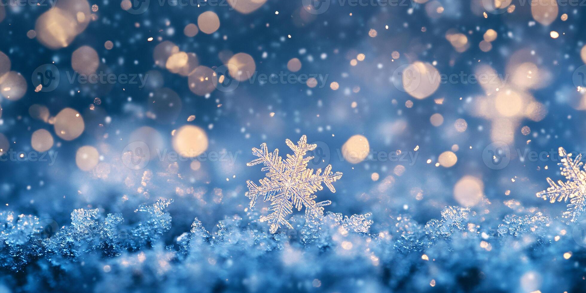 Delicate Snowflakes Sparkling Against a Rich Blue Night photo
