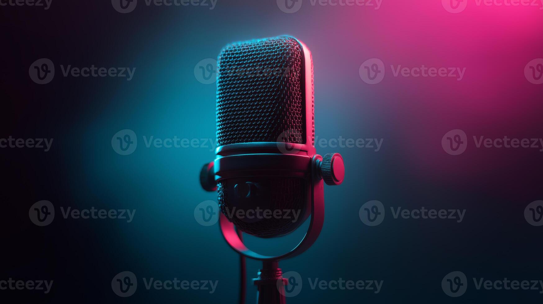 A professional microphone stands in a colorful studio setting, illuminated by soft pink and blue lights, ready to capture crisp sound for an engaging podcast session. photo