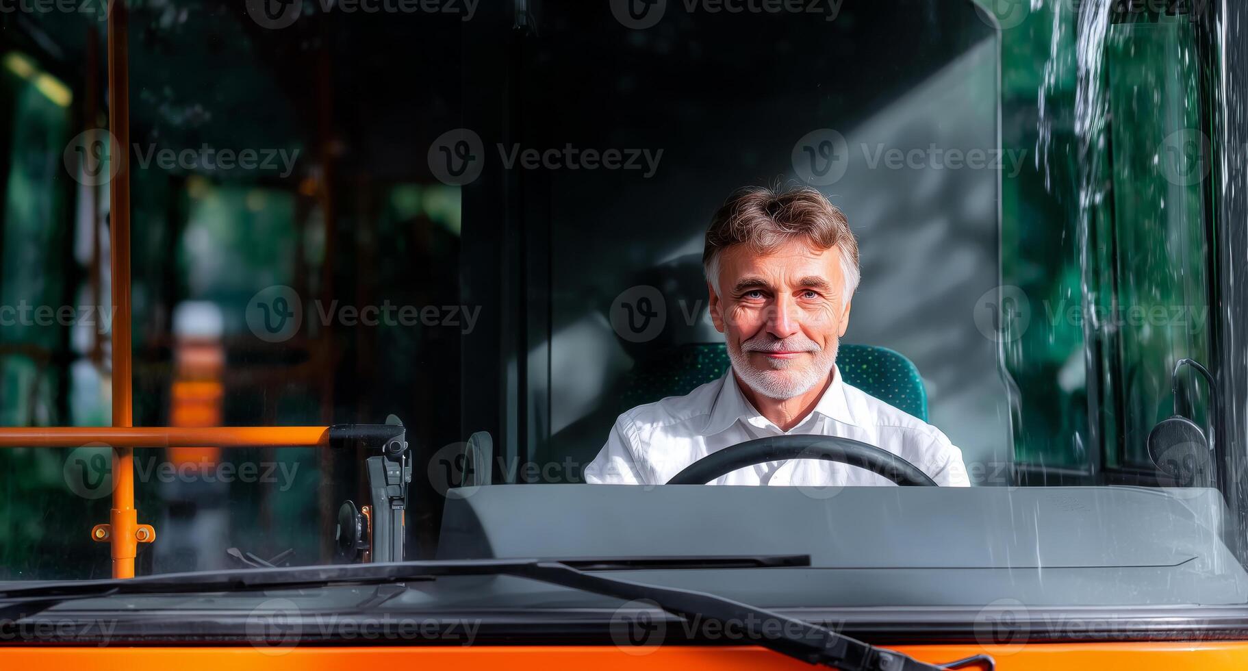 A man sits confidently at the wheel of a truck, displaying a cheerful demeanor. Sunlight streams through the windshield, enhancing the casual ambiance of the moment. photo