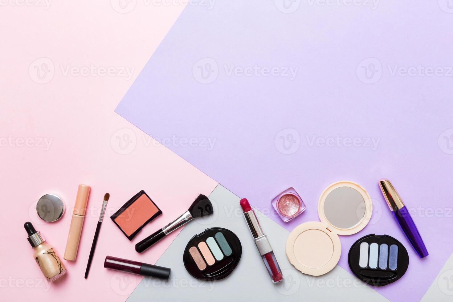 Professional makeup tools.Flat lay. Beauty, decorative cosmetics. Makeup brushes set and color eyeshadow palette on table background. Minimalistic style photo