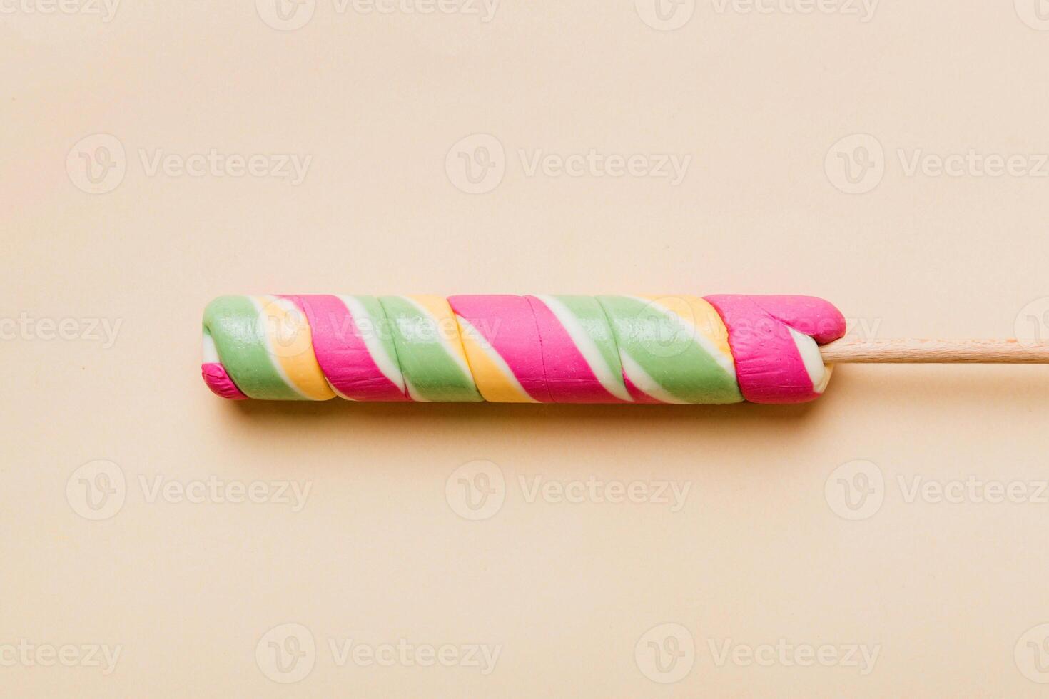 Colorful candies, lollypop -the colorful background, multicolored minimal style top view photo