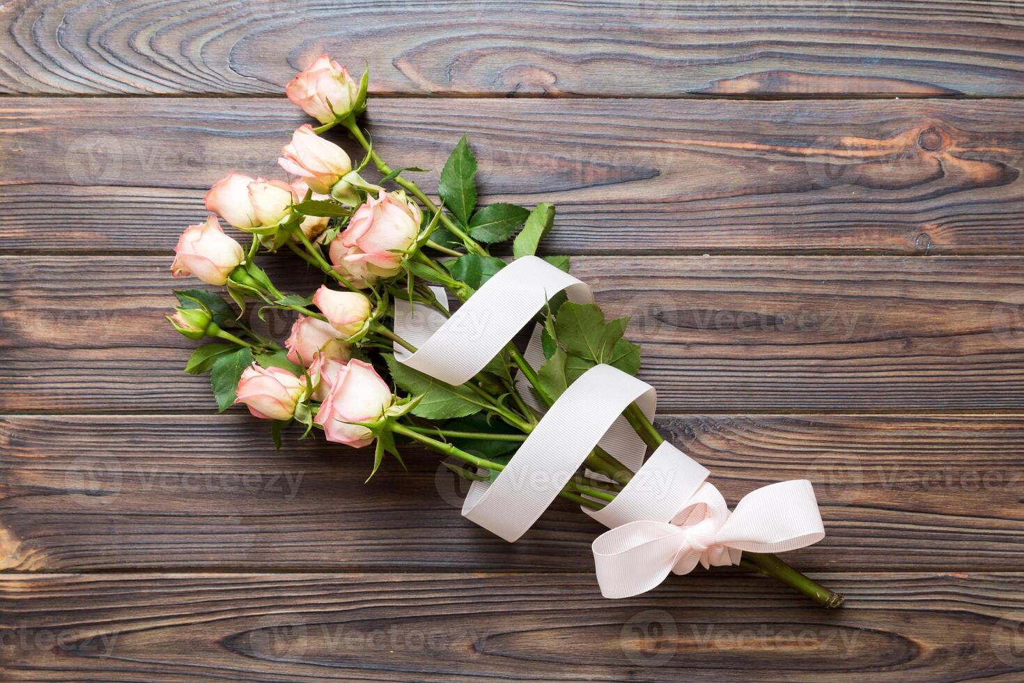 Bouquet of pinkand white roses on colored background. Mother's day, Valentines Day, Birthday celebration concept. Greeting card. Copy space for text photo