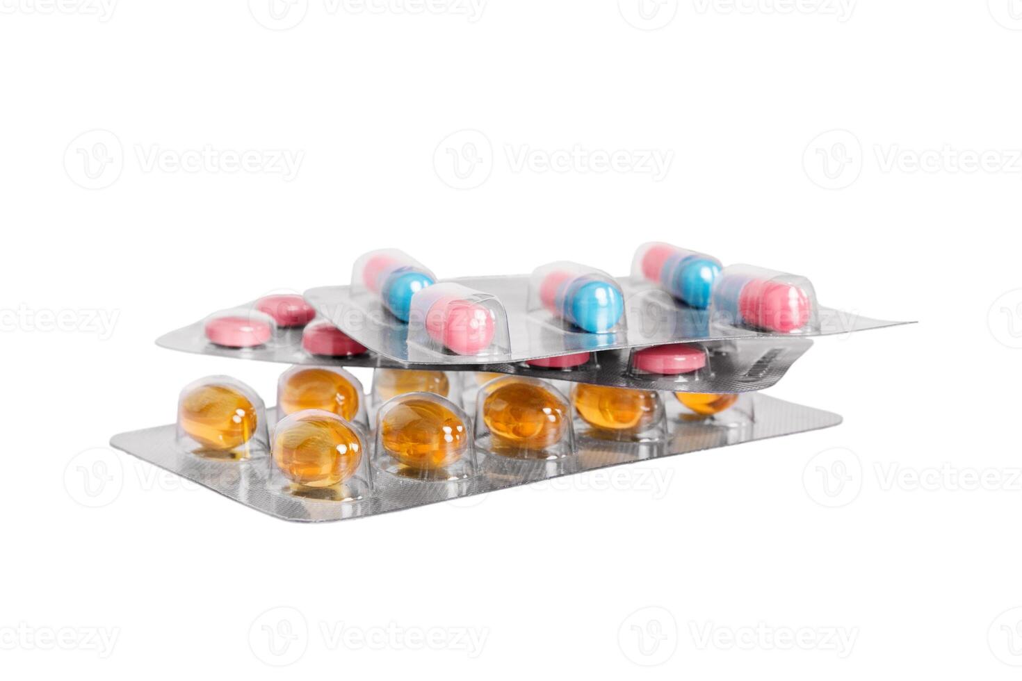 many different pill cartridges stacked. selective Focus. Packs of blister pills with tablets. Colored pastilles packages. A pile of medicine in blister packs. Pharmaceutical blister packs photo