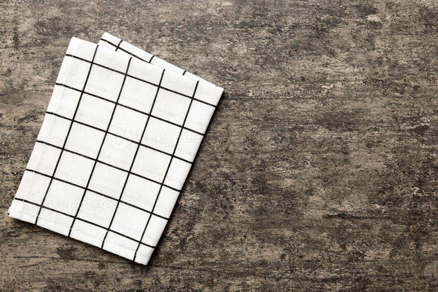 top view white empty kitchen napkin isolated on table background photo