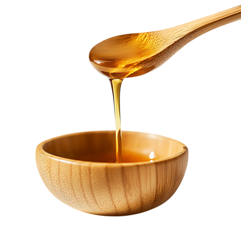 Honey pouring from wooden spoon into bowl isolated on a transparent background png