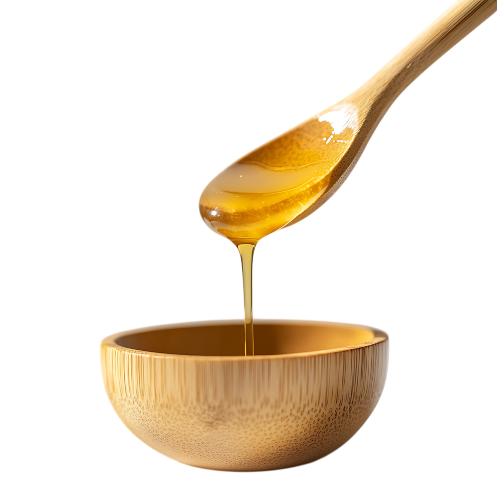 Honey pouring from wooden spoon into bamboo bowl isolated on a transparent background png