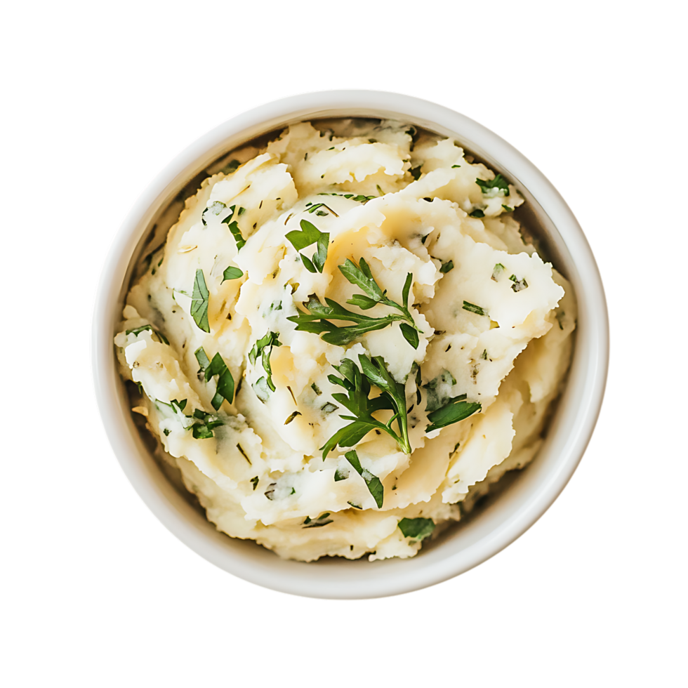 Bowl of creamy mashed potatoes with parsley isolated on transparent background png