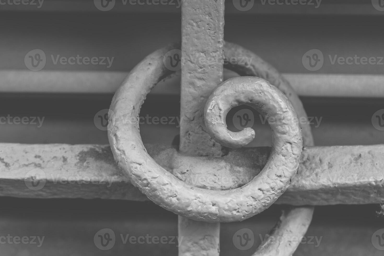 Delicate ironwork detail showcases intricate craftsmanship in a historical urban setting photo