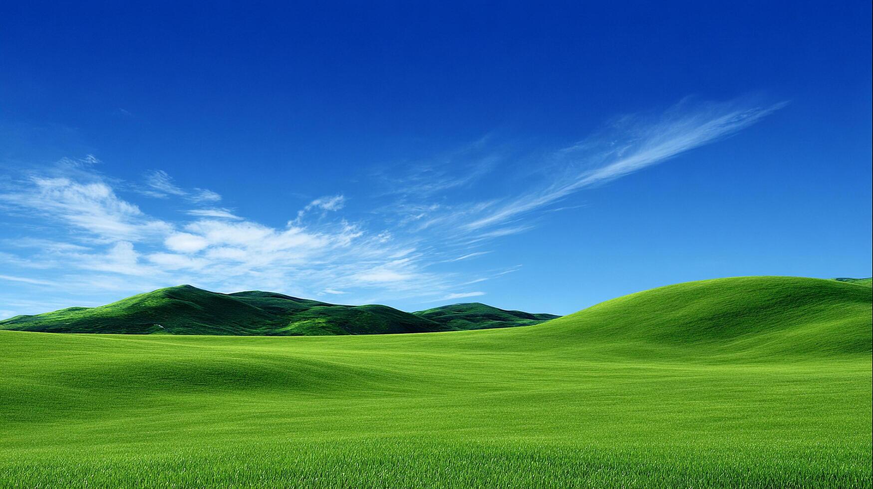 Bright summer valley landscape with clear blue sky photo