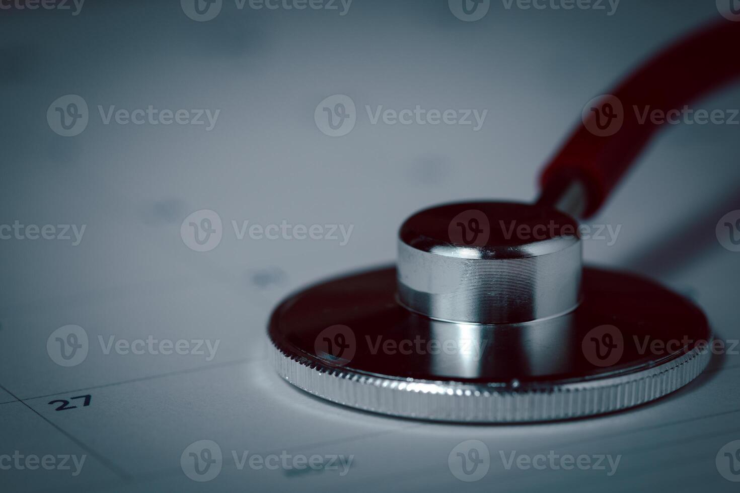 Stethoscope on Calendar, A Symbol of Health Check Reminders and Medical Planning photo