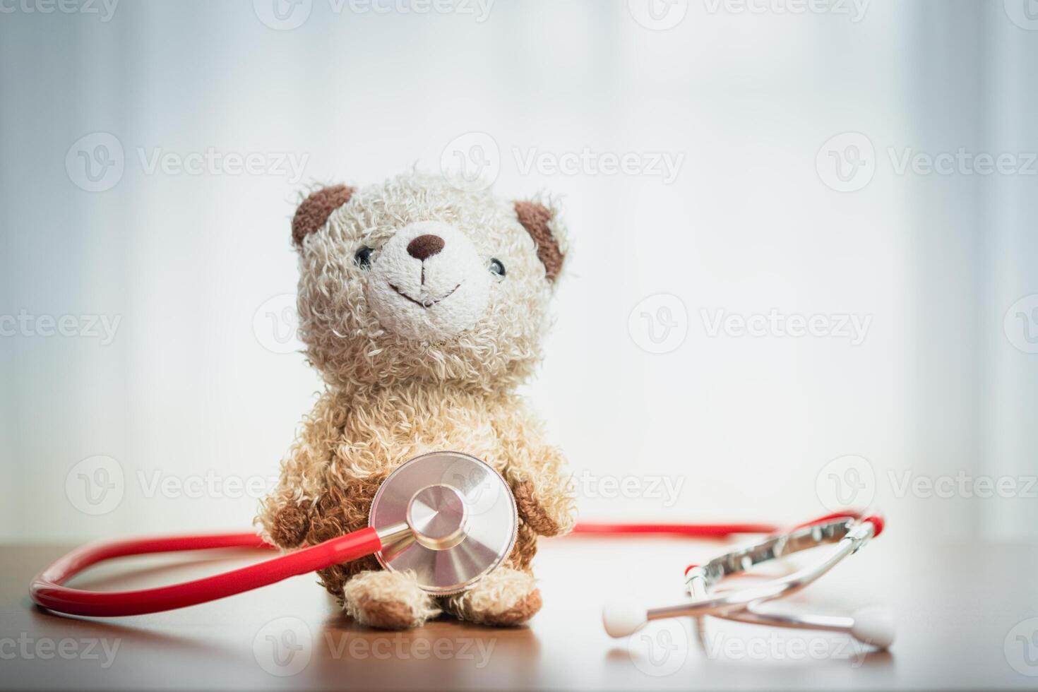 Teddy Bear with Stethoscope, Symbolizing Warmth, Healthcare, and Compassionate Care for Children photo
