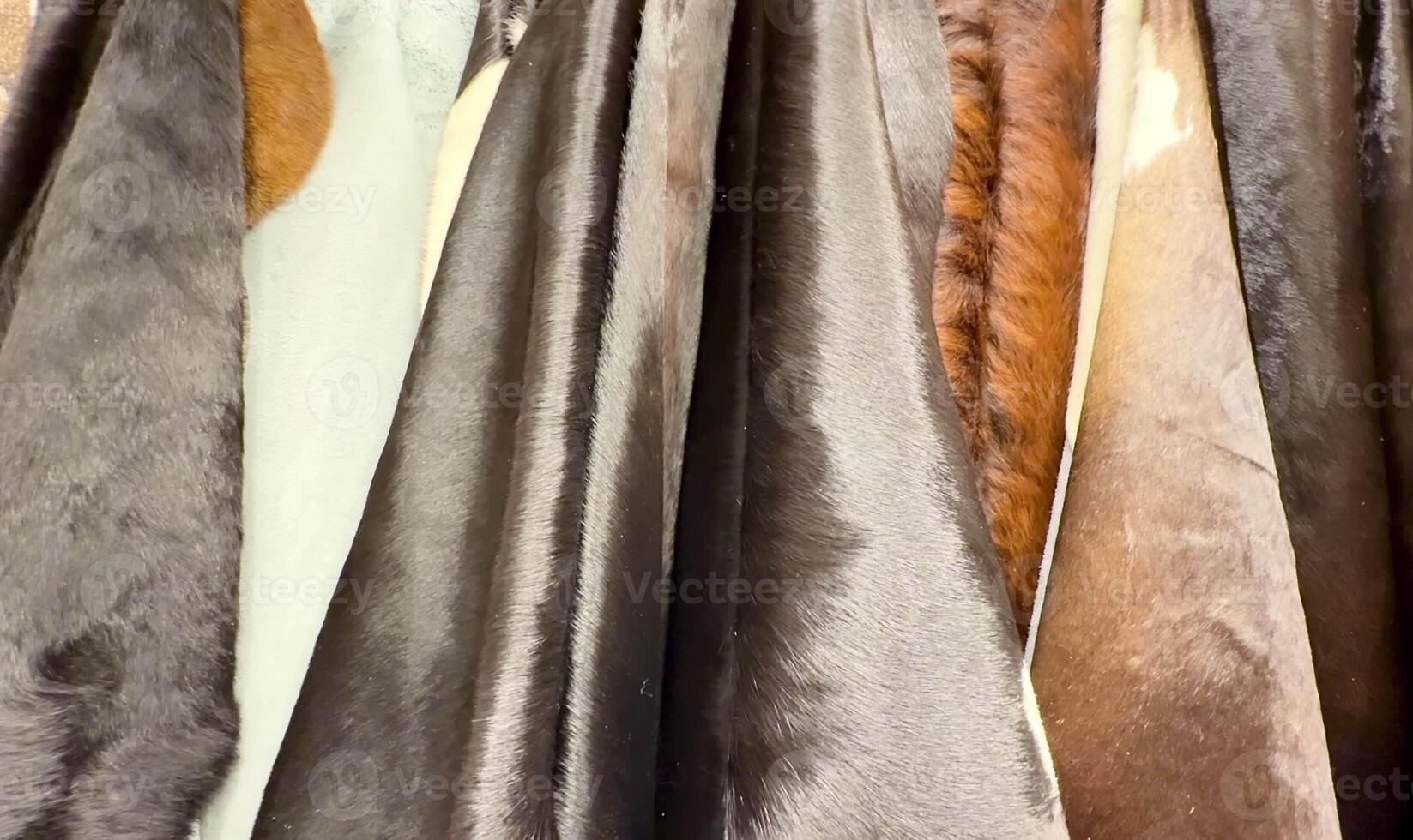 A beautiful collection of rich, soft fabrics that showcase a wide variety of diverse textures and earthy tones photo
