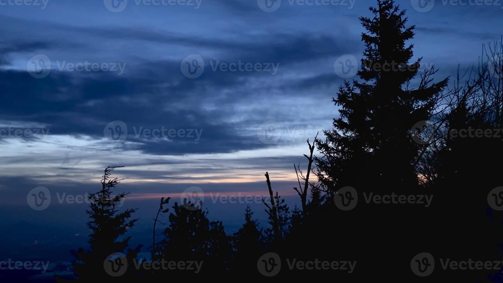 Brightly lit night sky in the winter mountains. High quality 4k footage photo