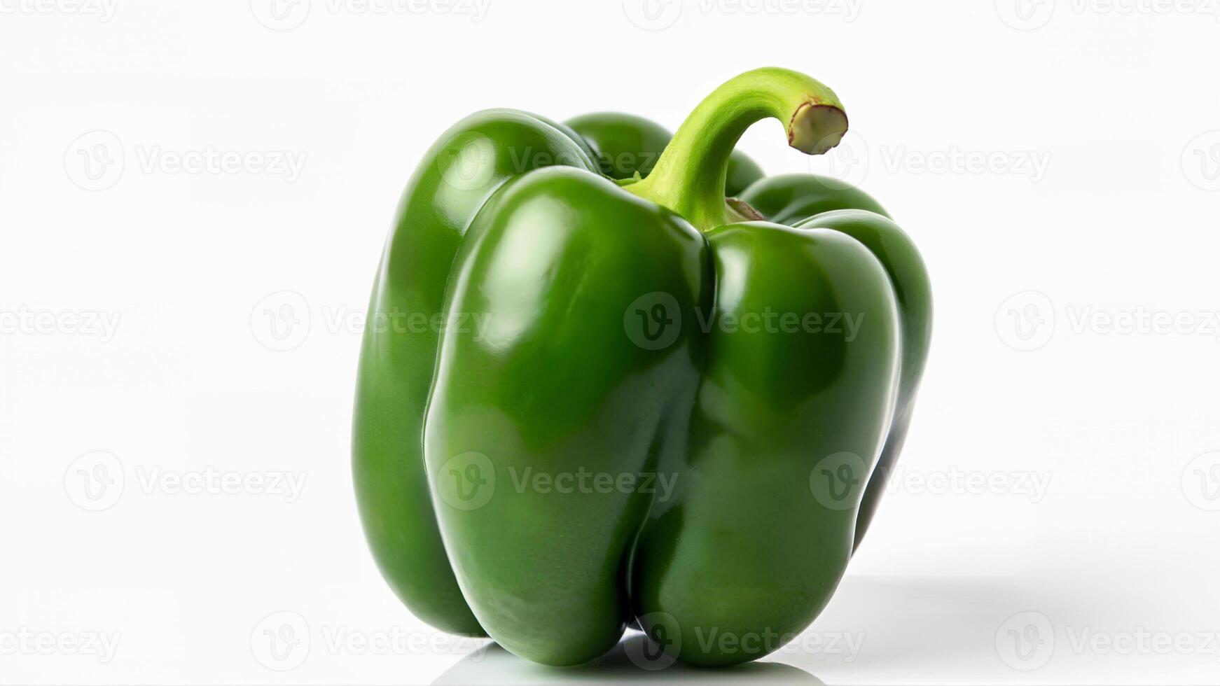 Single green bell pepper isolated on a white background for food, nutrition, and healthy eating concepts. Image suitable for recipes, grocery, and diet related content. photo