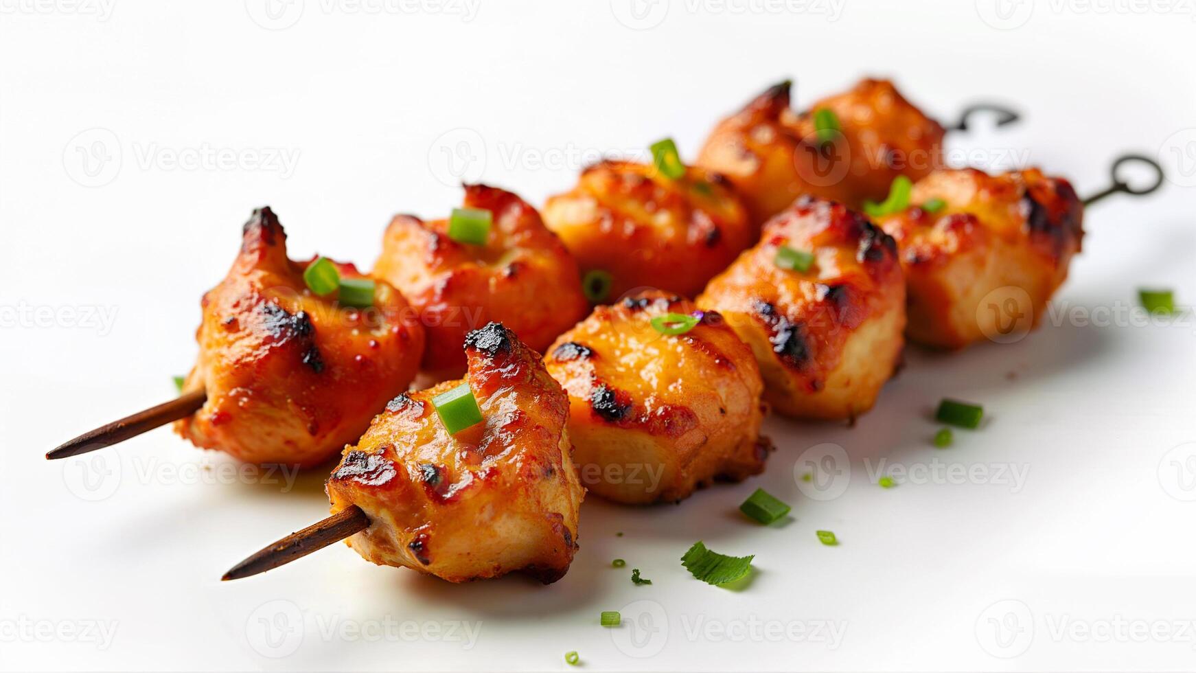 Crispy Grilled Chicken Skewers on Plate photo