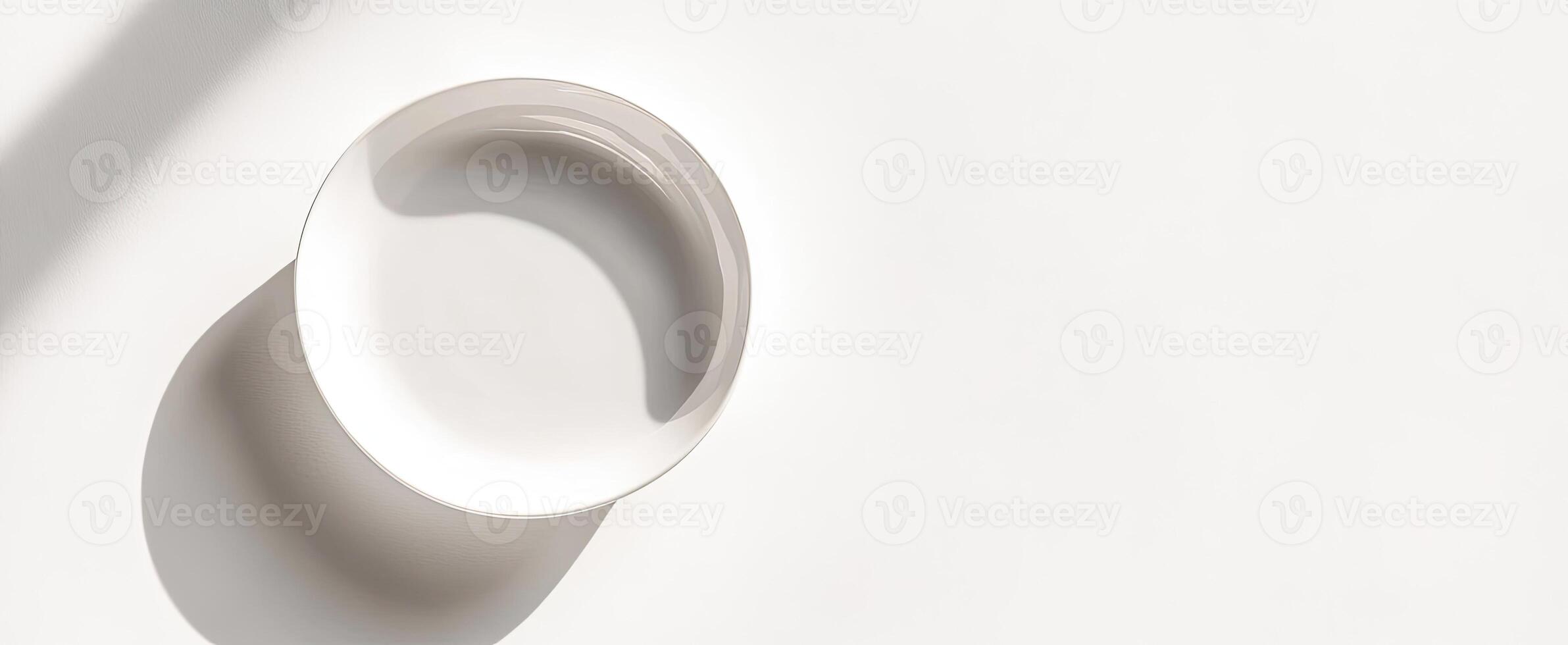 White ceramic bowl on a white background with shadow photo