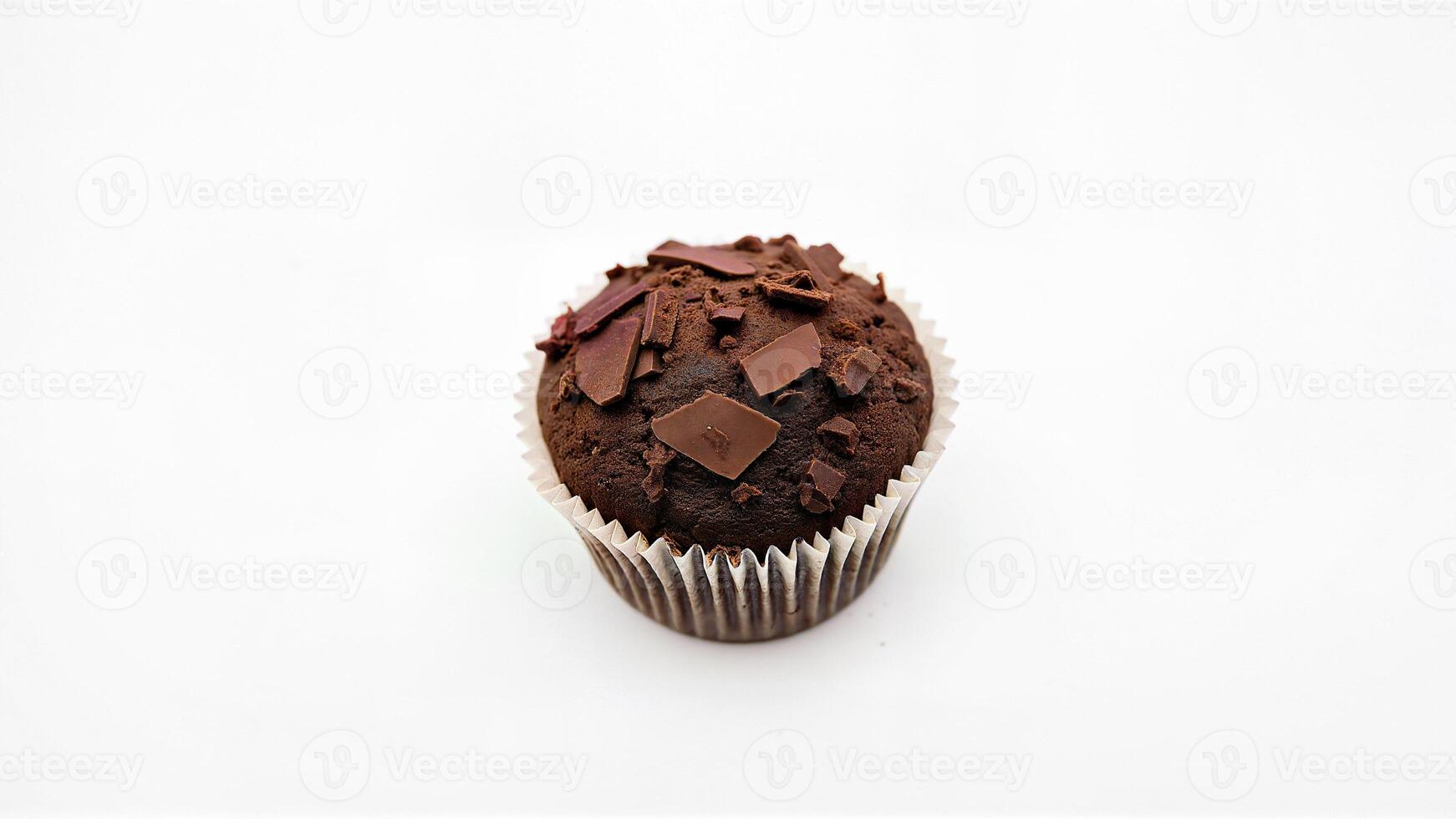 Simple chocolate muffin isolated background. Food image for bakery, dessert, or snack product presentation and advertising. photo