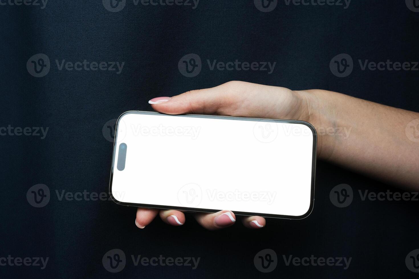 Mock up with blank phone in woman hand showing white screen photo
