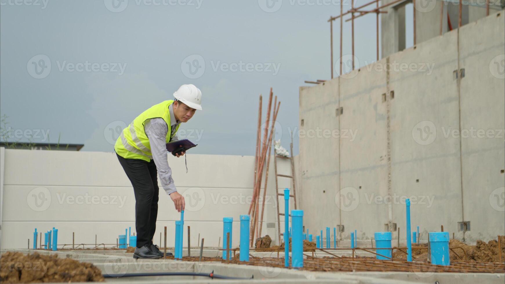 Engineers supervise construction work and inspect the foundation work of residential buildings,92 photo
