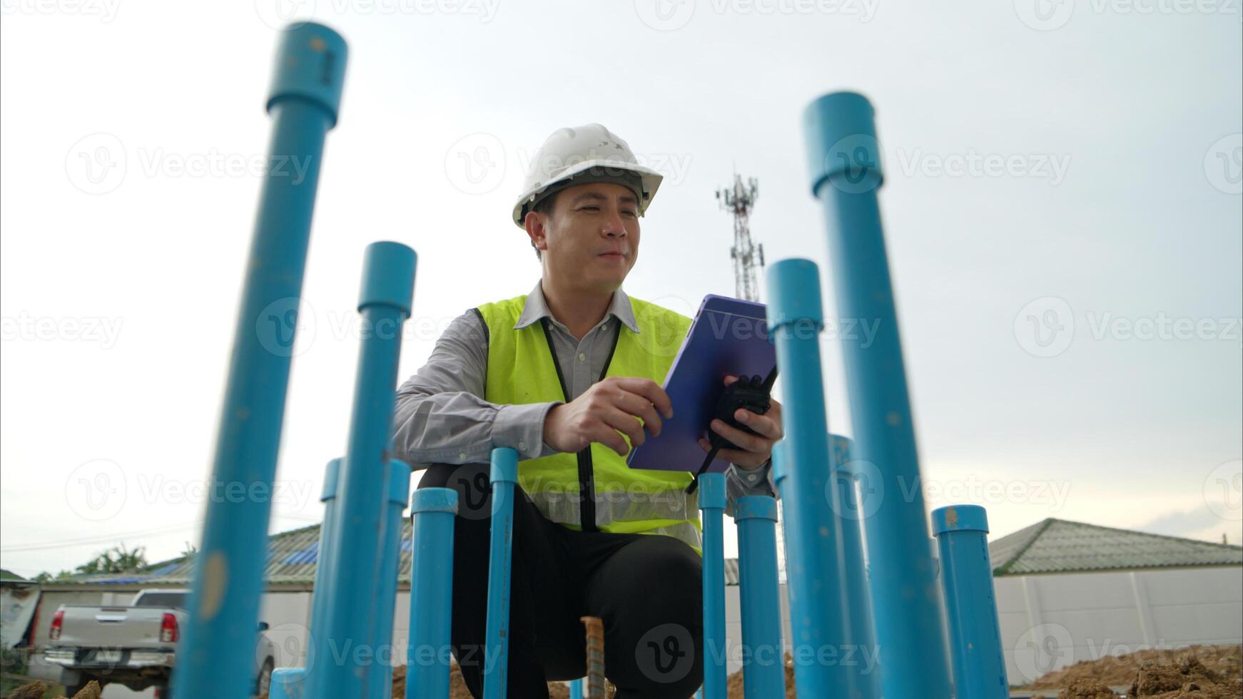 Engineers supervise construction work and inspect the foundation work of residential buildings,87 photo