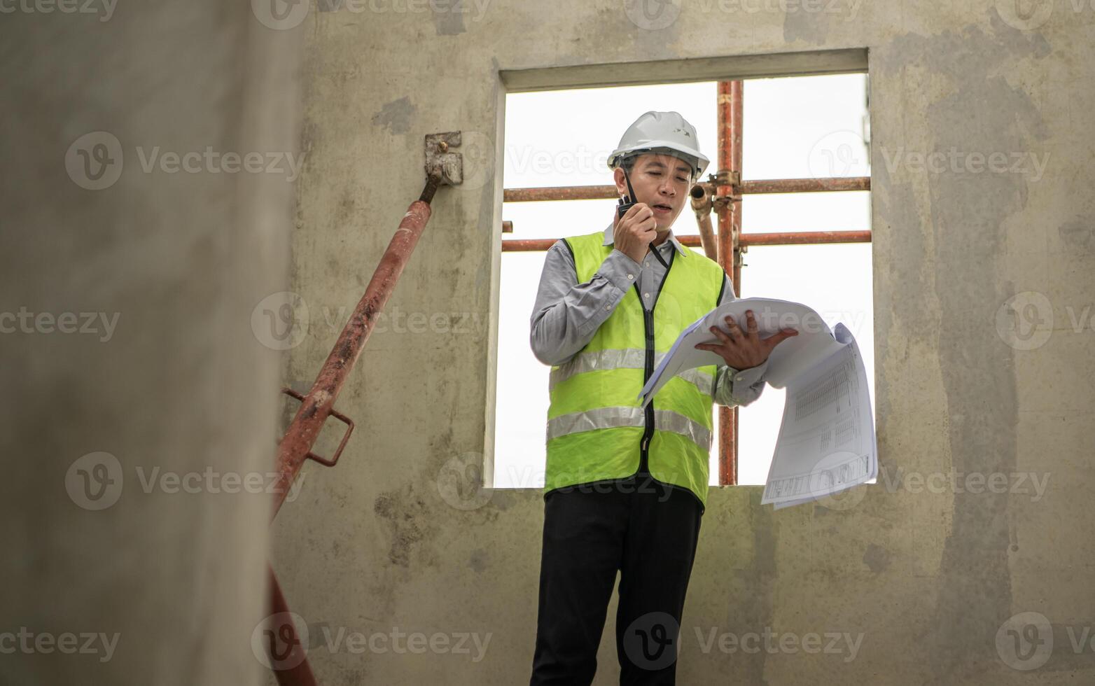 Engineers construction projects inspect and supervise the construction of building walls,45 photo