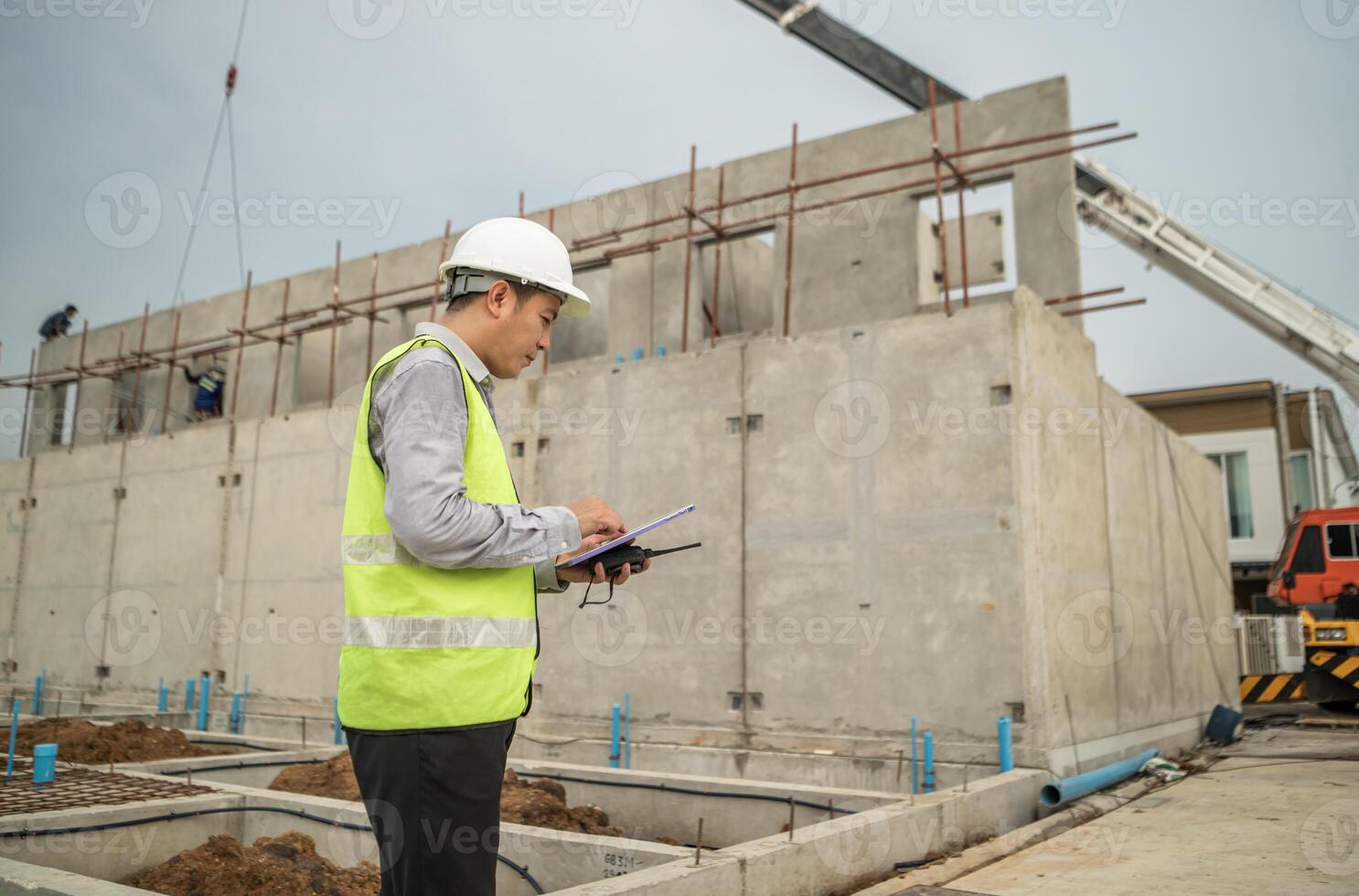 Engineers construction projects inspect and supervise the construction of building walls,20 photo