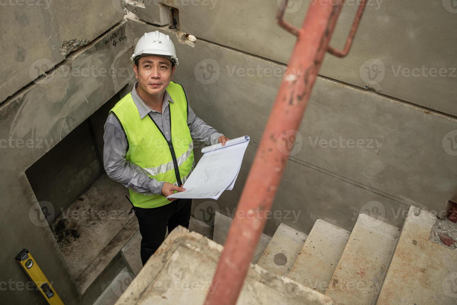Engineers construction projects inspect and supervise the construction of building walls,7 photo