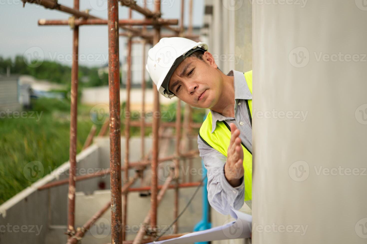 Engineers construction projects inspect and supervise the construction of building walls,6 photo