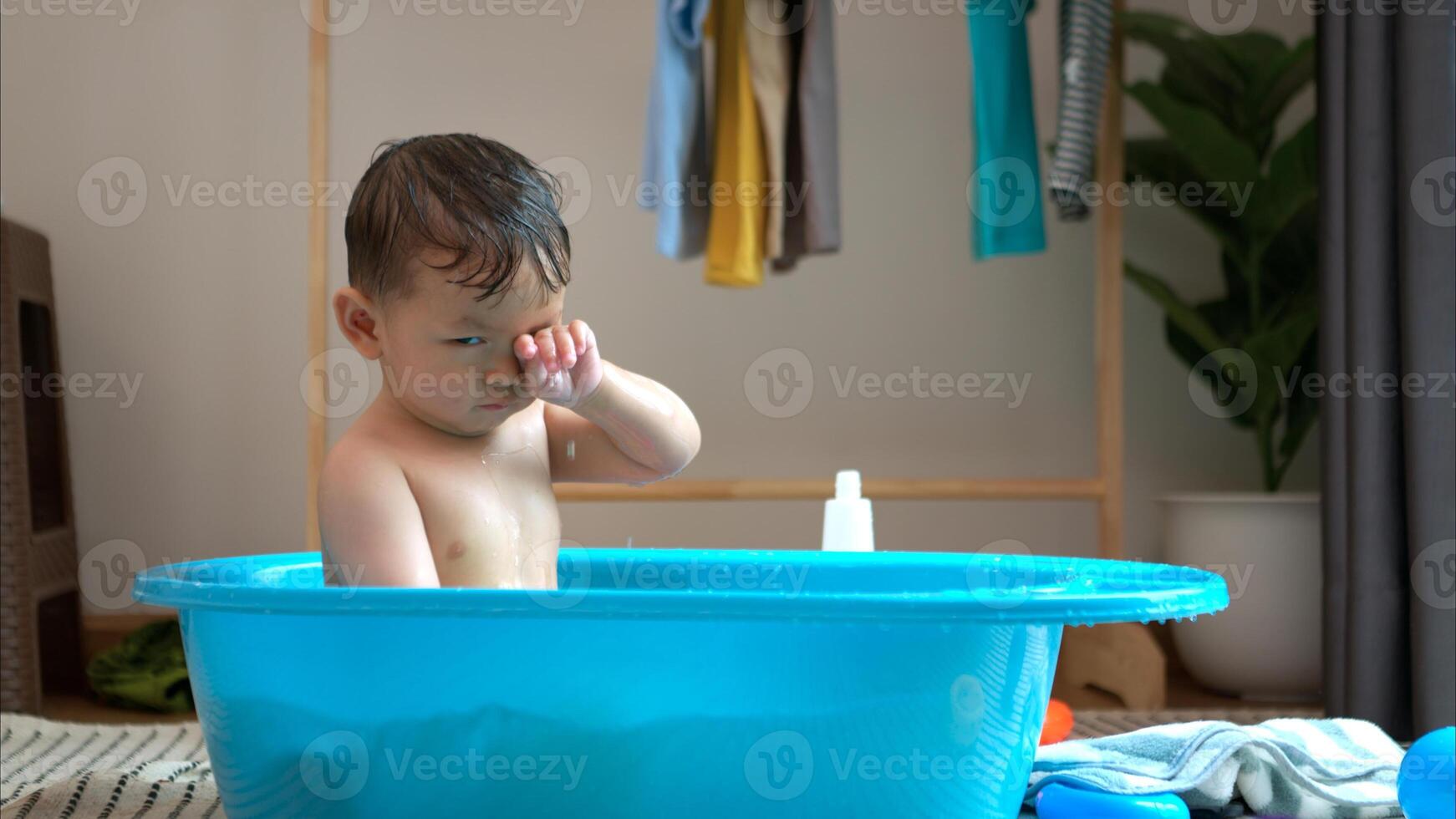 Mom and little child with taking a shower and dressing at home in the morning,327 photo