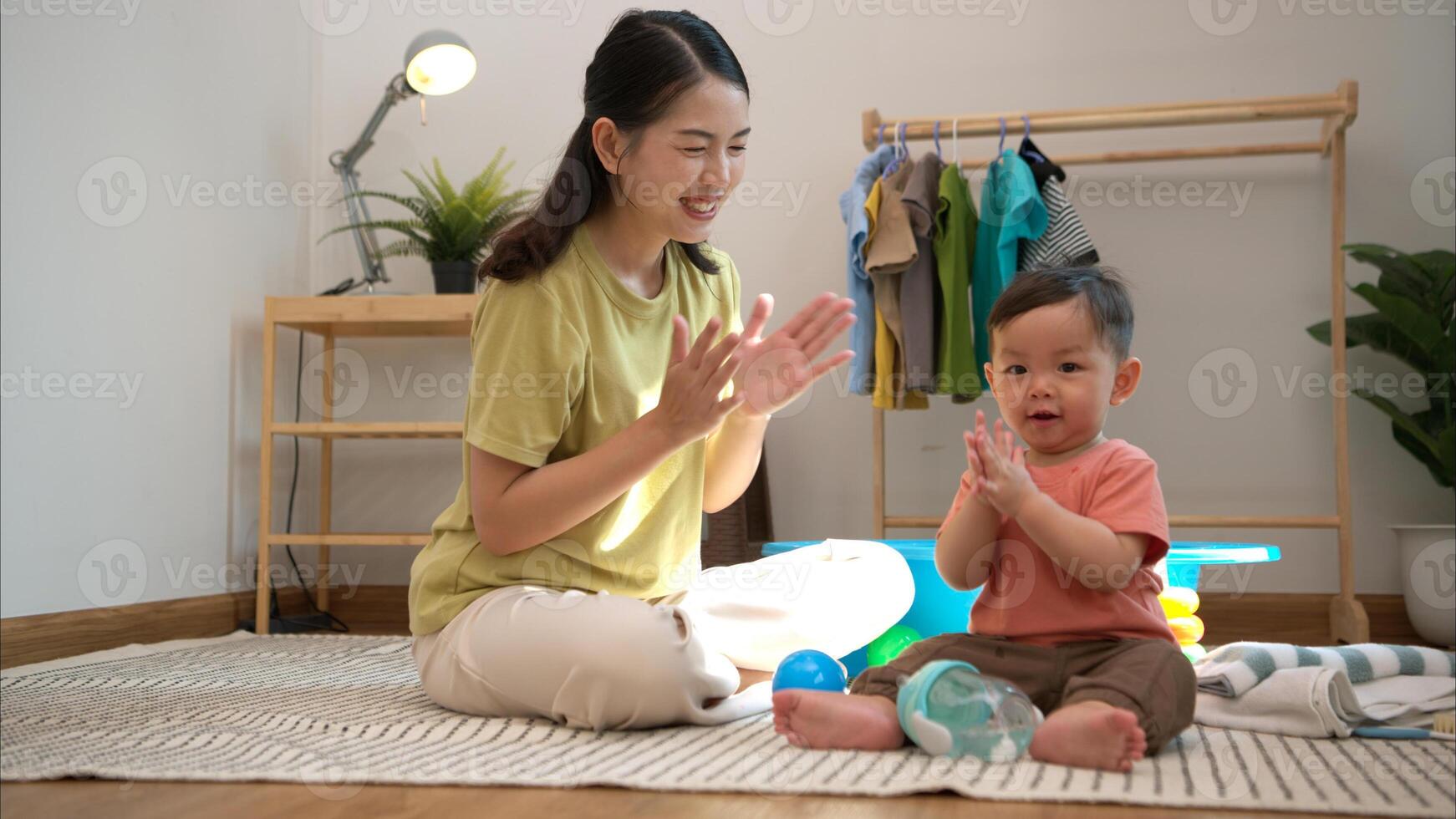 Little boy with breakfast with mom feeding him before bathing him,328 photo