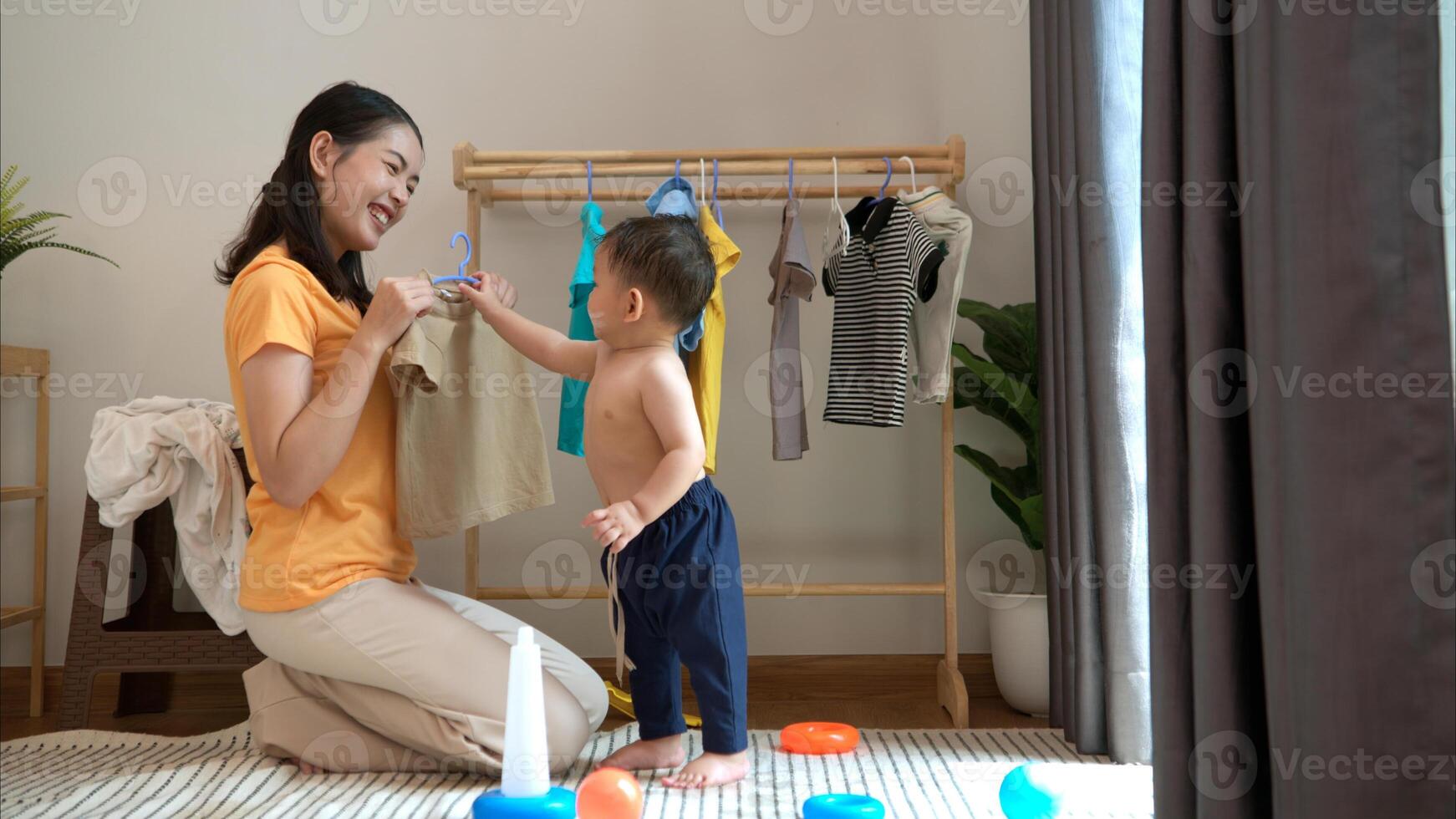 Mom and little child with taking a shower and dressing at home in the morning,314 photo