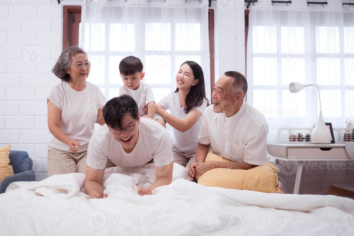 Before putting the kids to bed, parents, grandparents, and kid unwind and play in the bedroom,185 photo