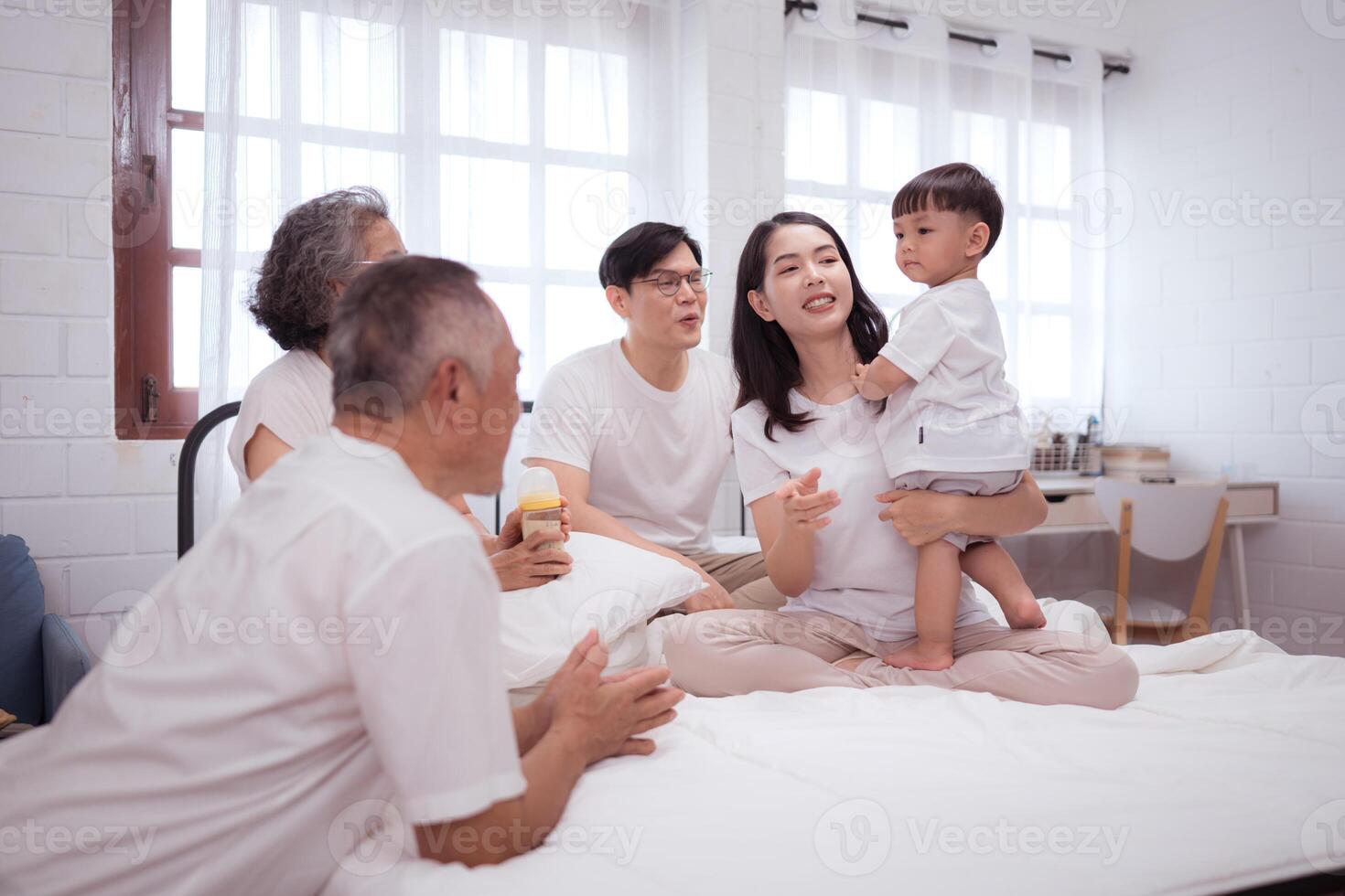 Before putting the kids to bed, parents, grandparents, and kid unwind and play in the bedroom,175 photo