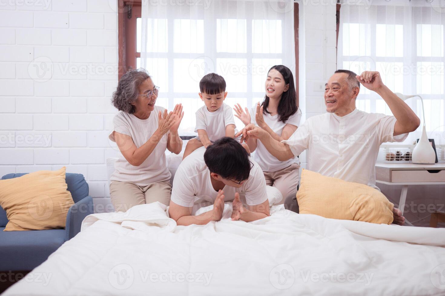 Before putting the kids to bed, parents, grandparents, and kid unwind and play in the bedroom,170 photo