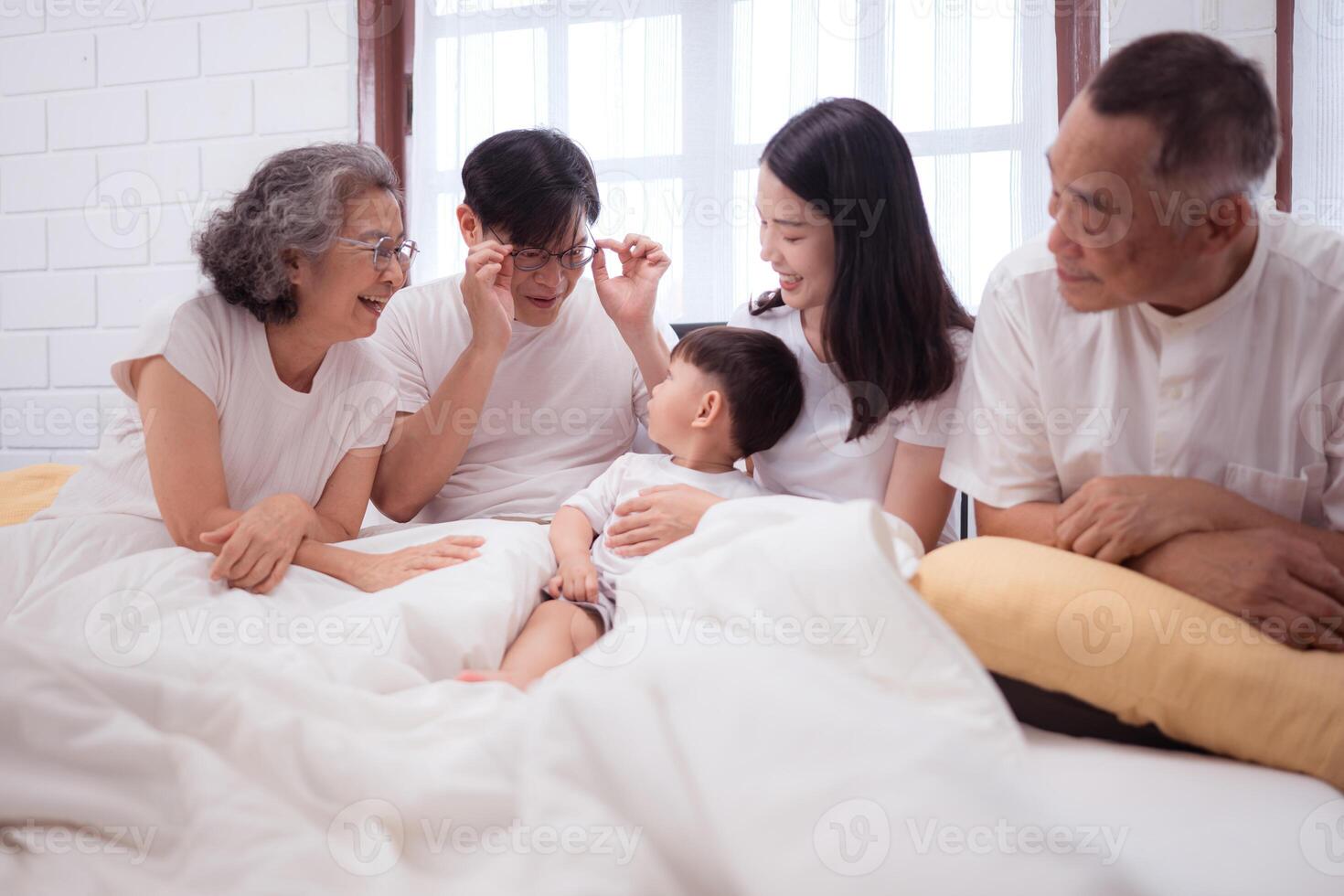Before putting the kids to bed, parents, grandparents, and kid unwind and play in the bedroom,157 photo