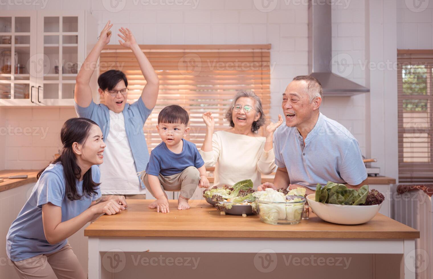 Happy Asian family preparing food together in a bright kitchen,117 photo