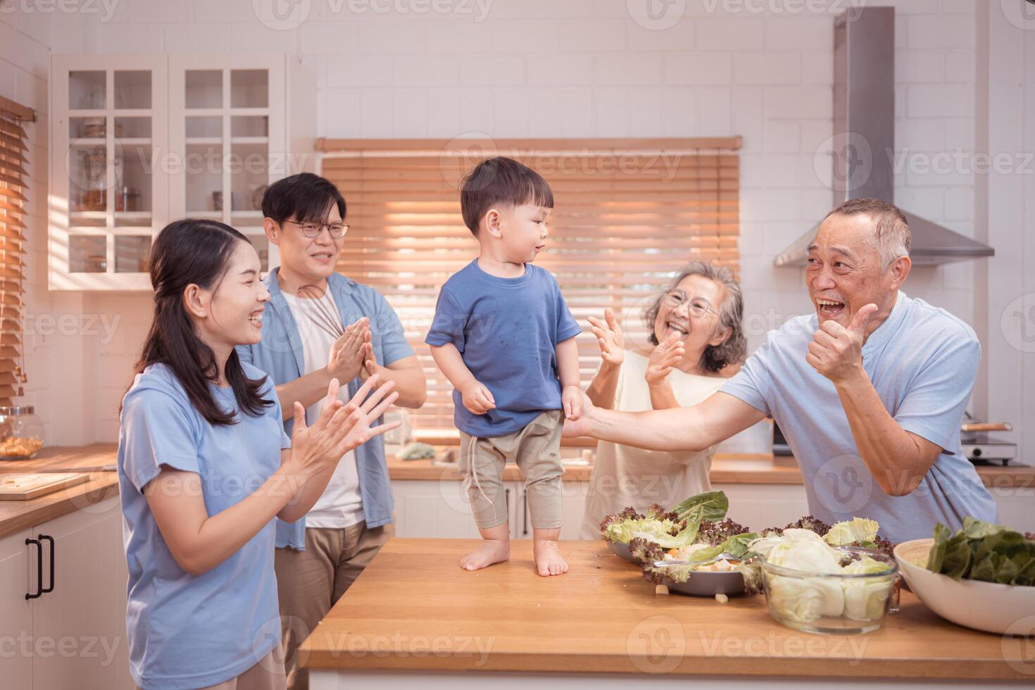Happy Asian family preparing food together in a bright kitchen,76 photo