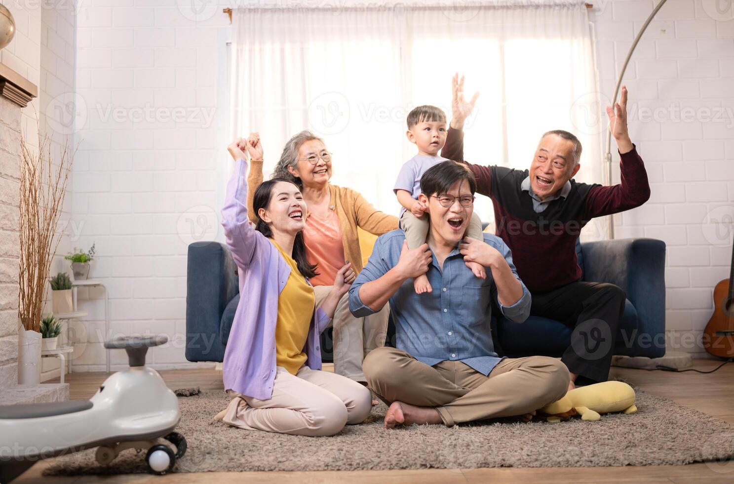 Happy multi-generational Asian family enjoying quality time together at home,48 photo