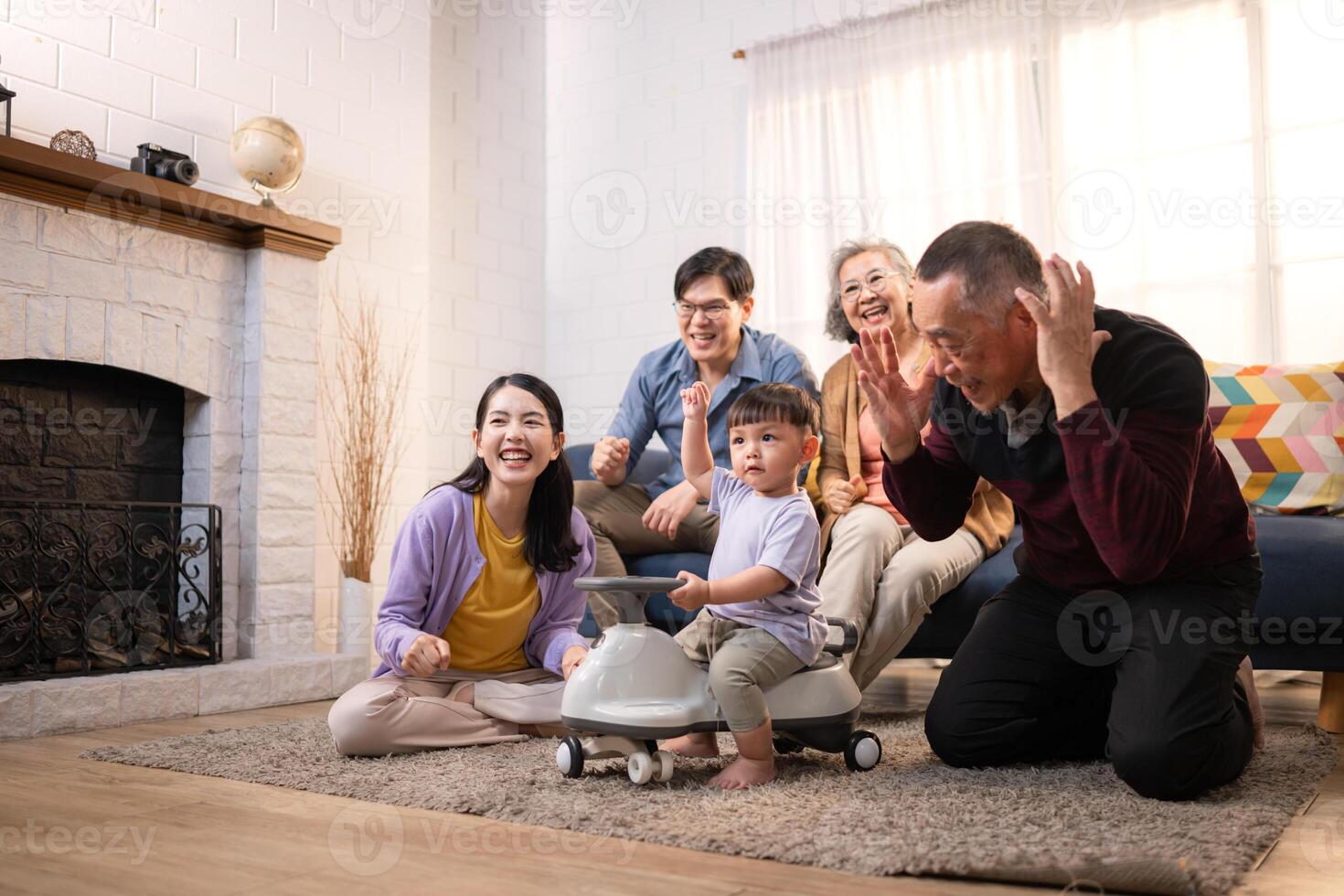 Happy multi-generational Asian family enjoying quality time together at home,38 photo