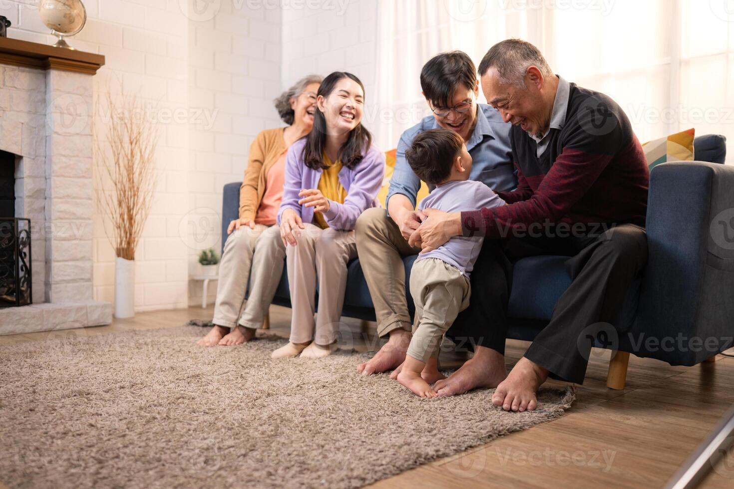 Happy multi-generational Asian family enjoying quality time together at home,21 photo