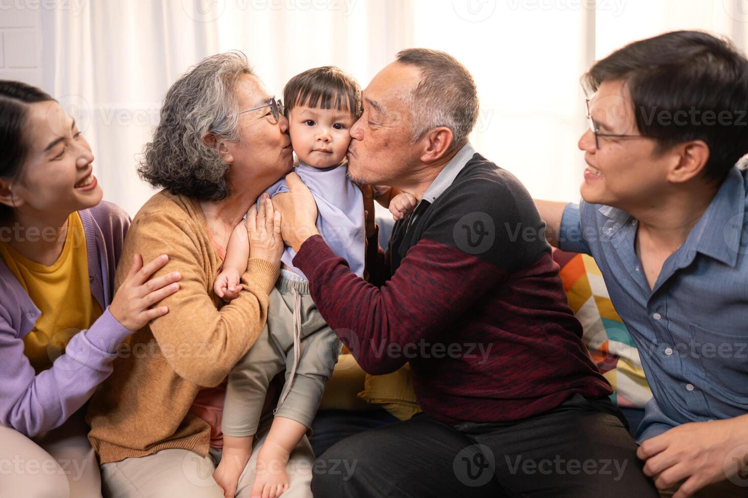 Happy multi-generational Asian family enjoying quality time together at home,14 photo