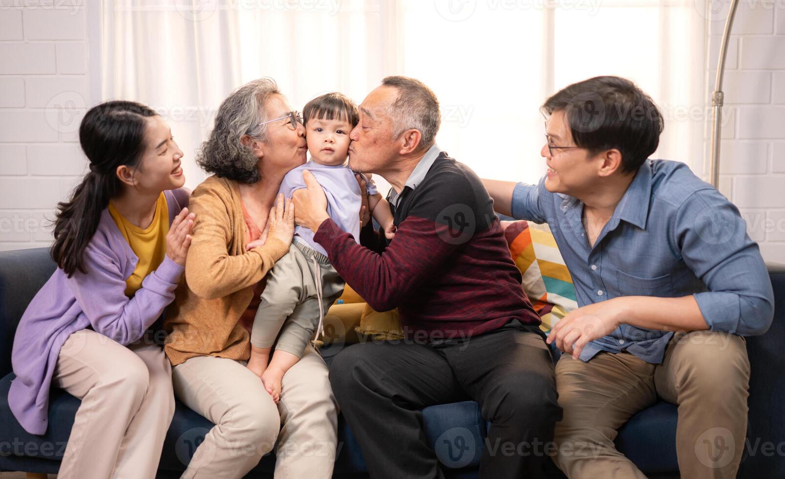 Happy multi-generational Asian family enjoying quality time together at home,6 photo