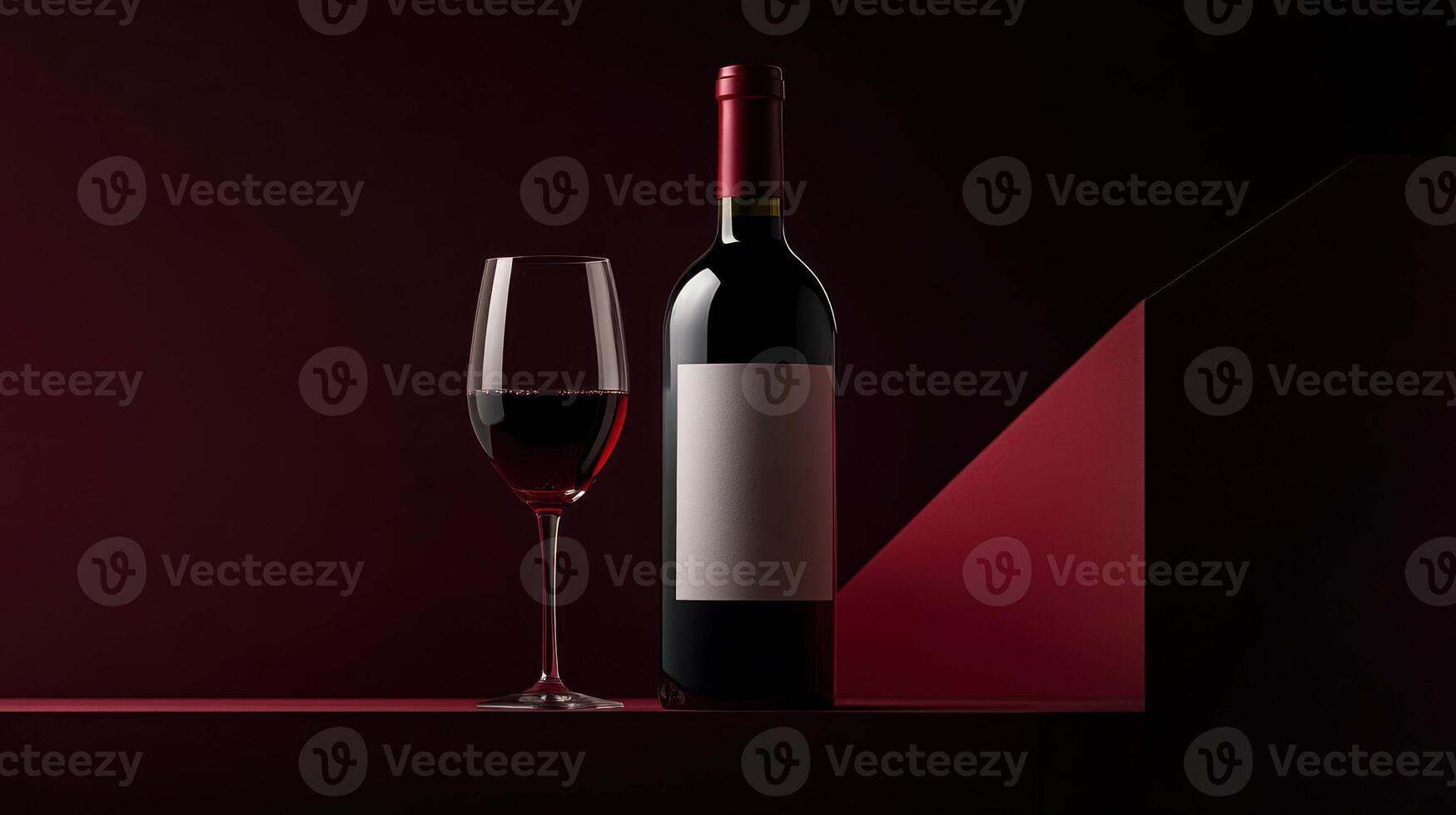 Red wine bottle and glass on dark background photo