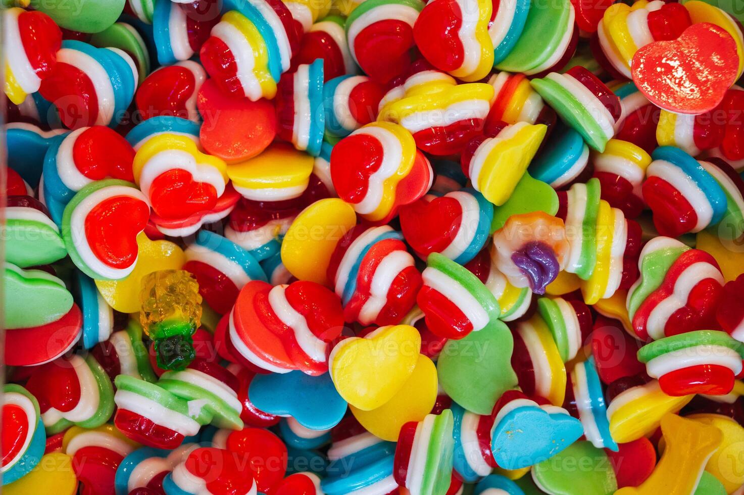 background of colorful jelly hearts. photo