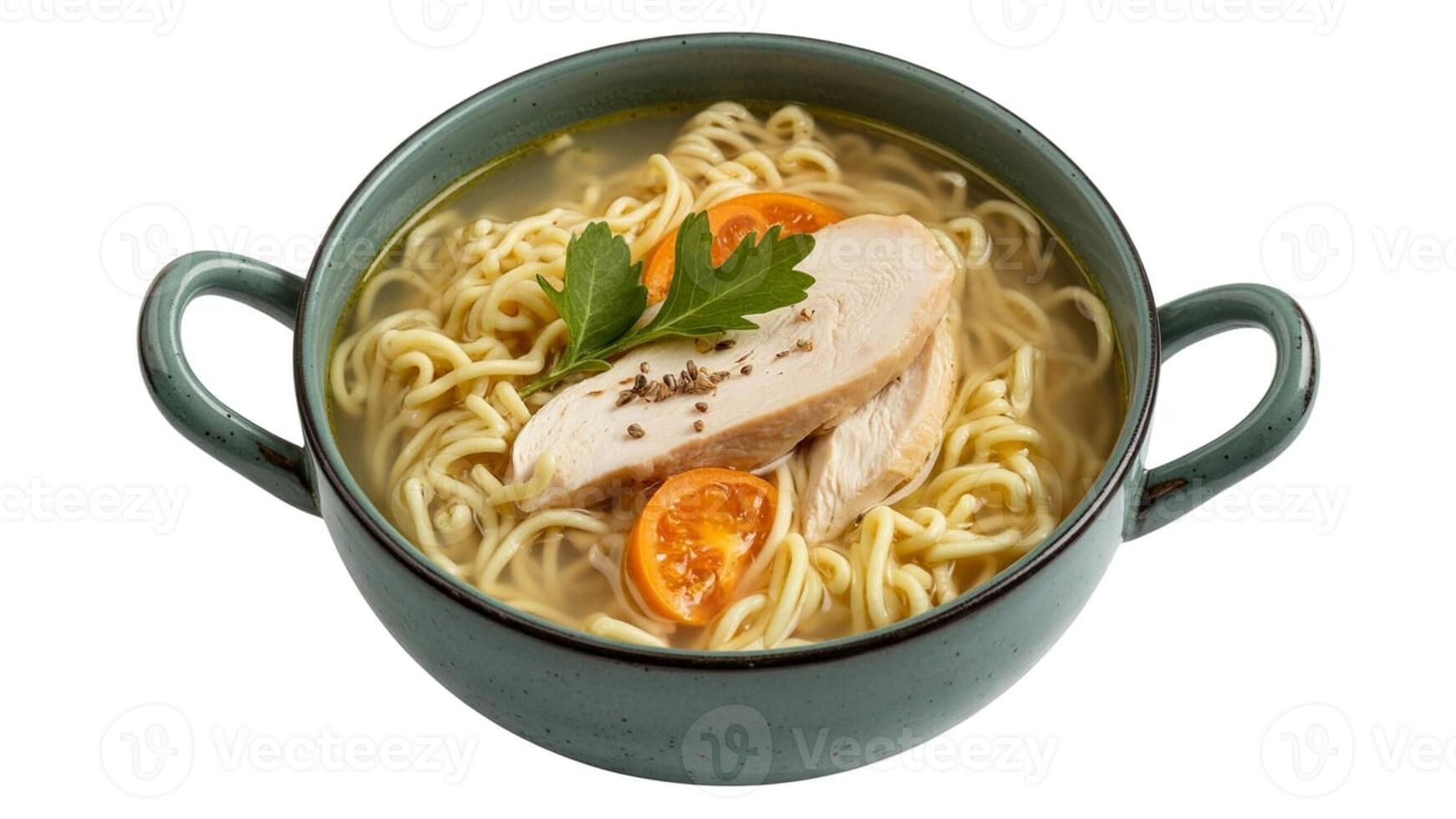A bowl of chicken noodle soup with parsley and tomato slices on a white background view from top photo