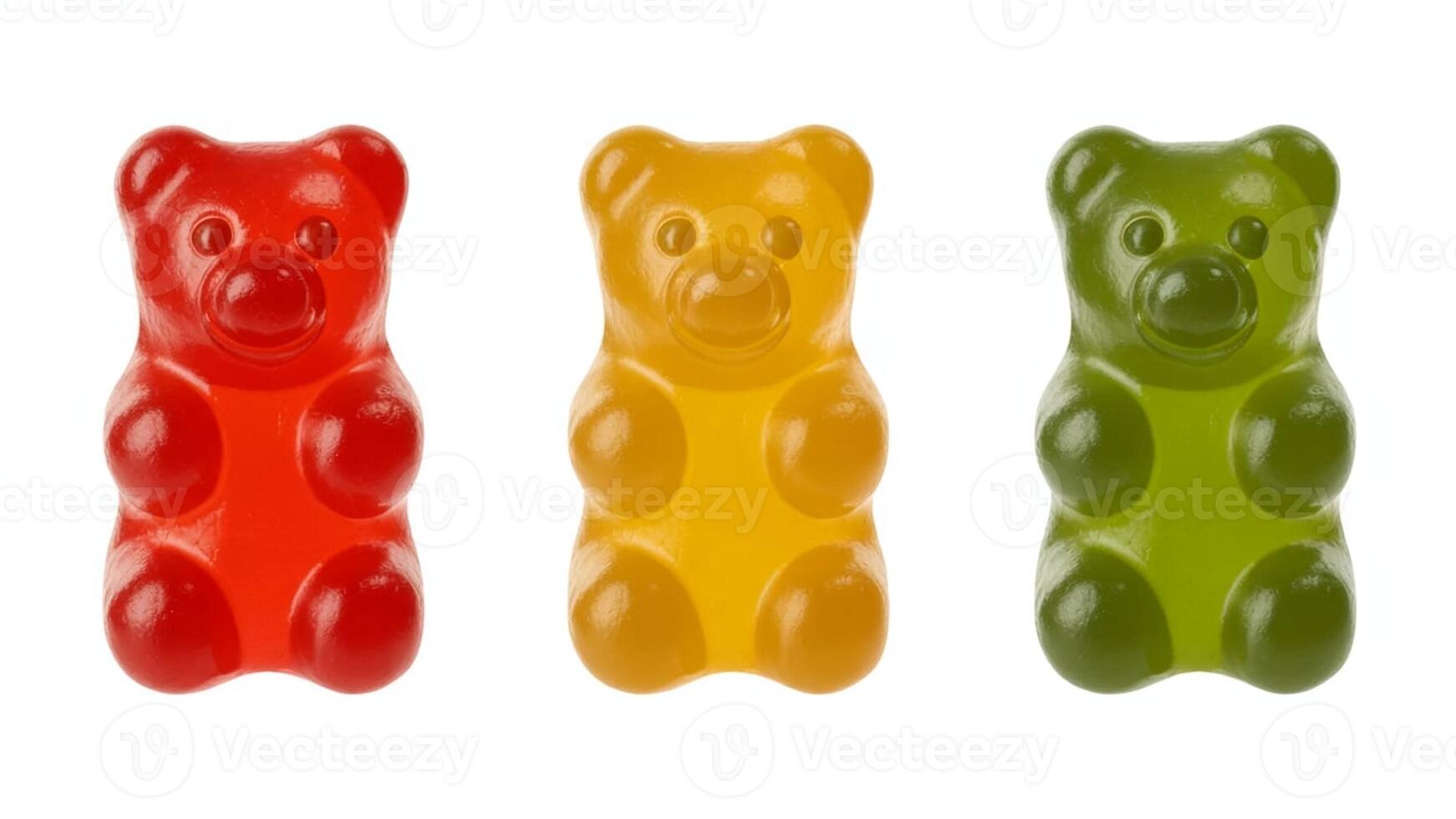 Close up of three gummy bears in red yellow and green on a white background photo