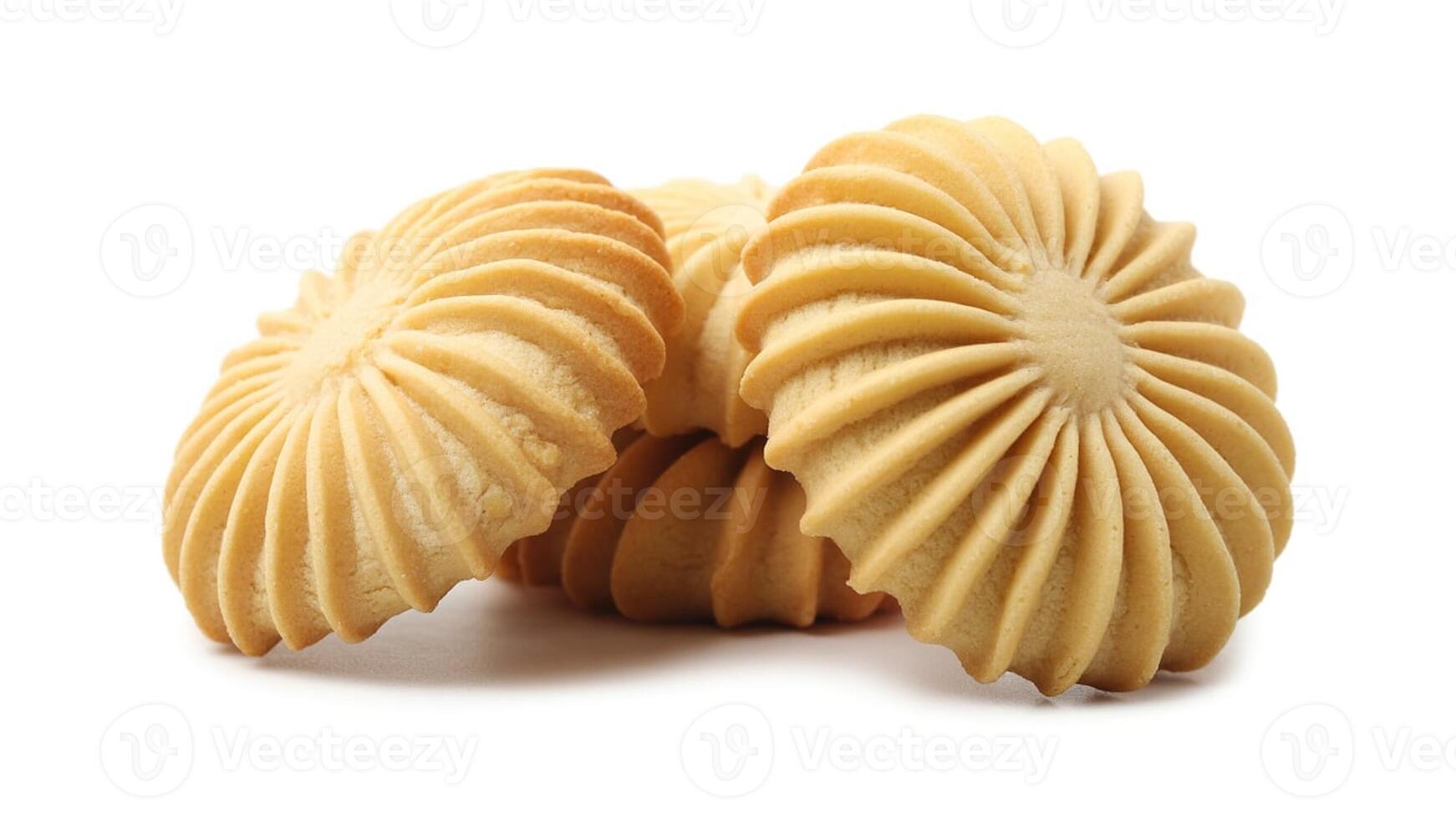 A close up view of several butter cookies stacked together on a white surface photo