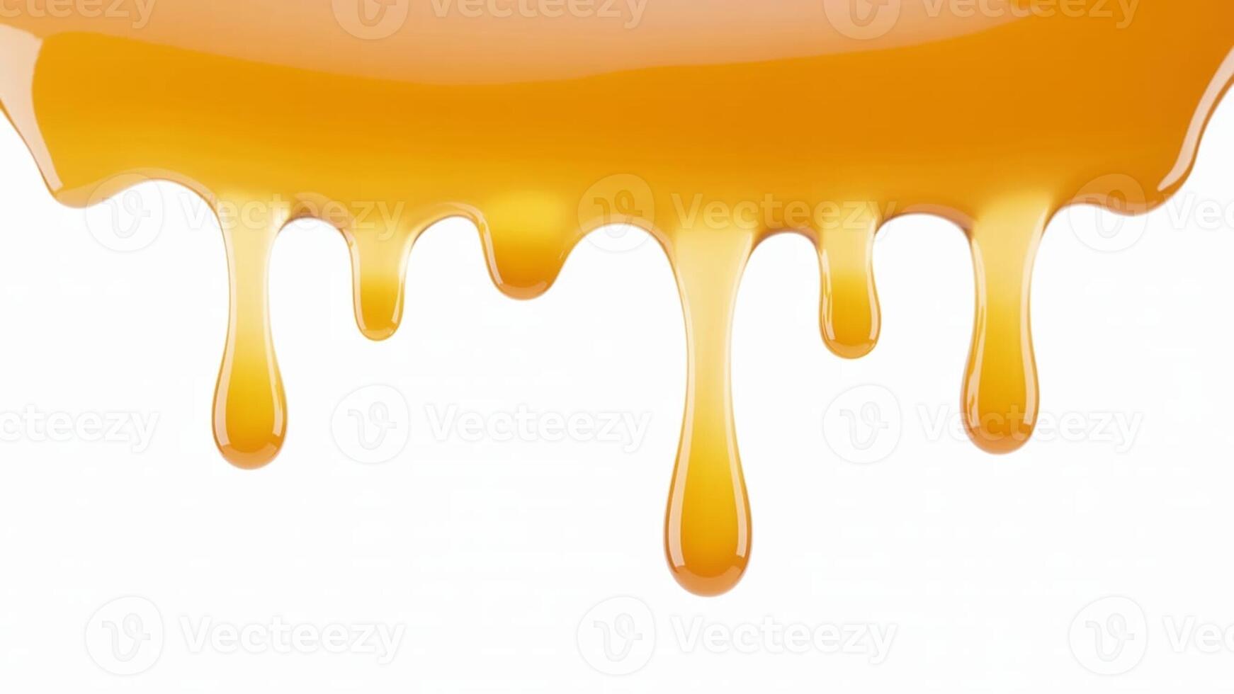 Close up of caramel dripping down a white surface, showing a sweet and sticky treat photo