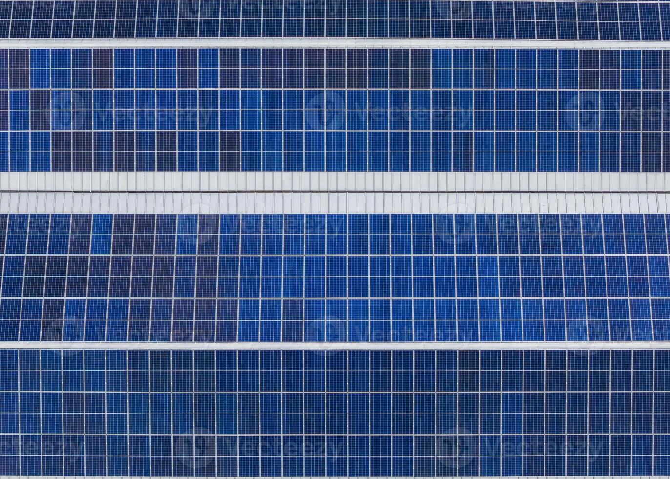 Solar panels installed on a roof, contributing to renewable energy generation and sustainability efforts photo